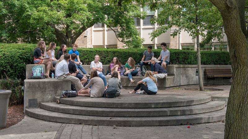 Pls Class Taking Place Outside Of Oshaughnessy Hall