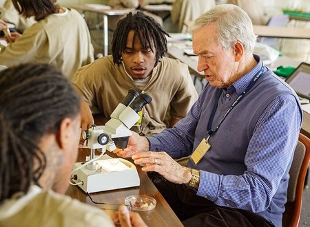 PLS Professor Emeritus Phil Sloan working with students at Westville Correctional Facility